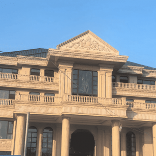 宜宾黄金麻别墅外墙干挂石材效果示例