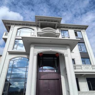 宜宾白麻别墅外墙干挂石材效果示例