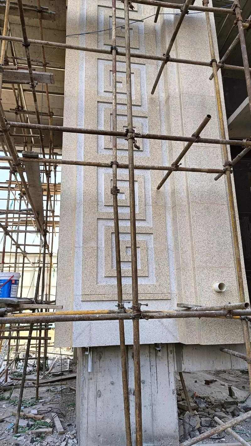 宜宾 黄金麻花岗岩别墅外墙干挂回纹造型效果